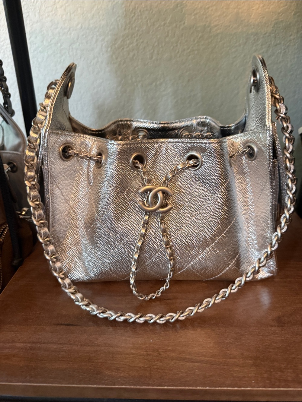 25 bag mini!  Metallic Silver Quilted Drawstring Chain Shoulder Bag